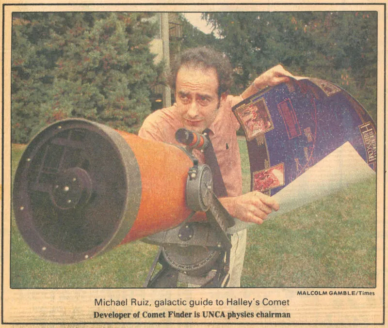 Doc outside with 8-inch telescope holding sky map.